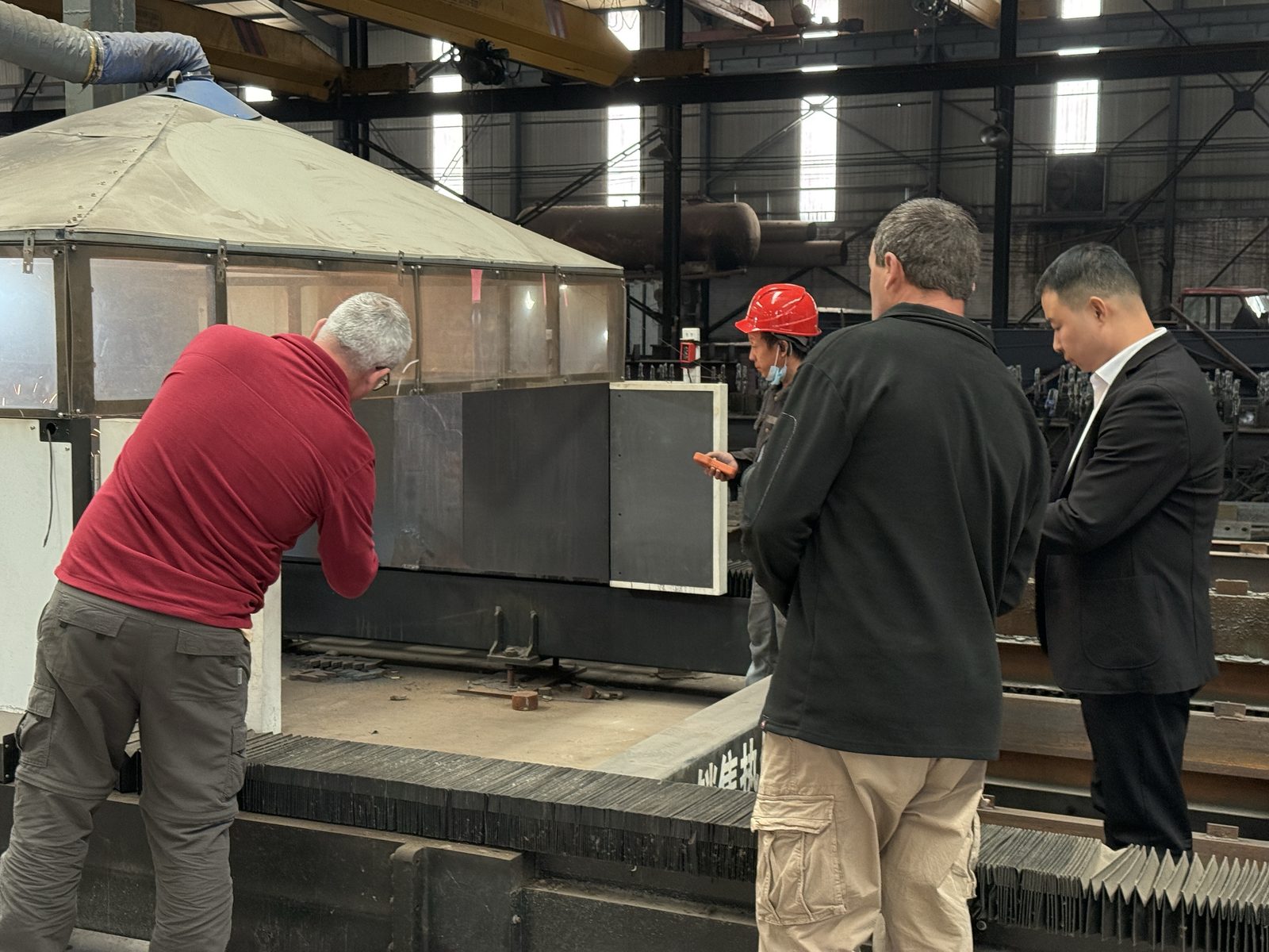 Buyer inspecting plate at the cutting line