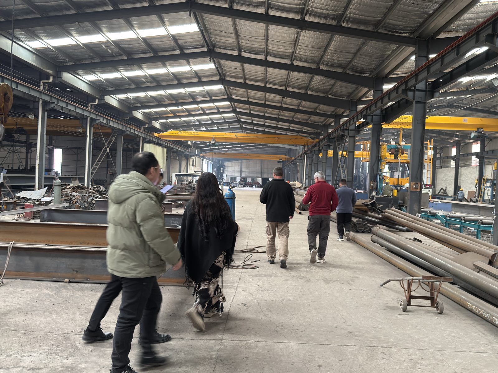 Assembly bay with fabricated members during a plant visit